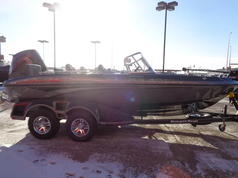 Slide: The Image of 2025 Ranger 1880MS boat on trailer in sunlight. - 3