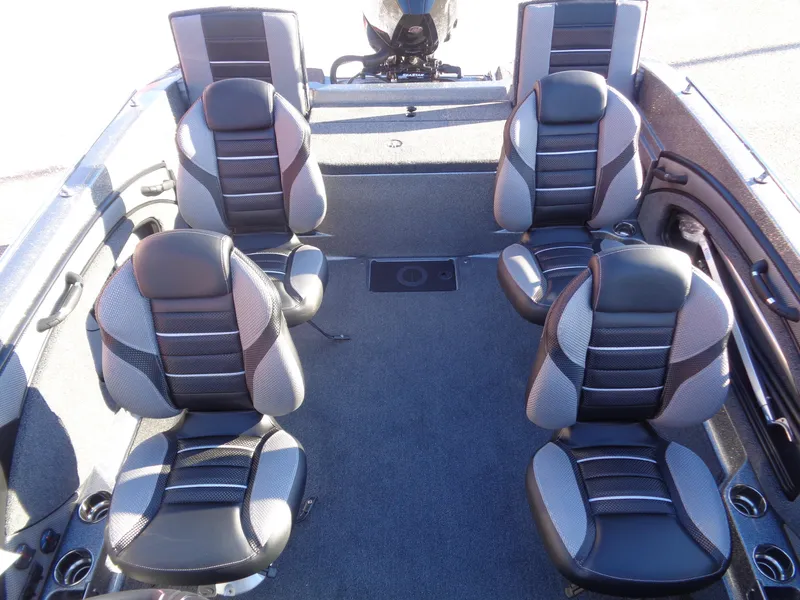 Slide: The Image of 2025 Ranger 1880MS boat interior with four cushioned seats. - 7