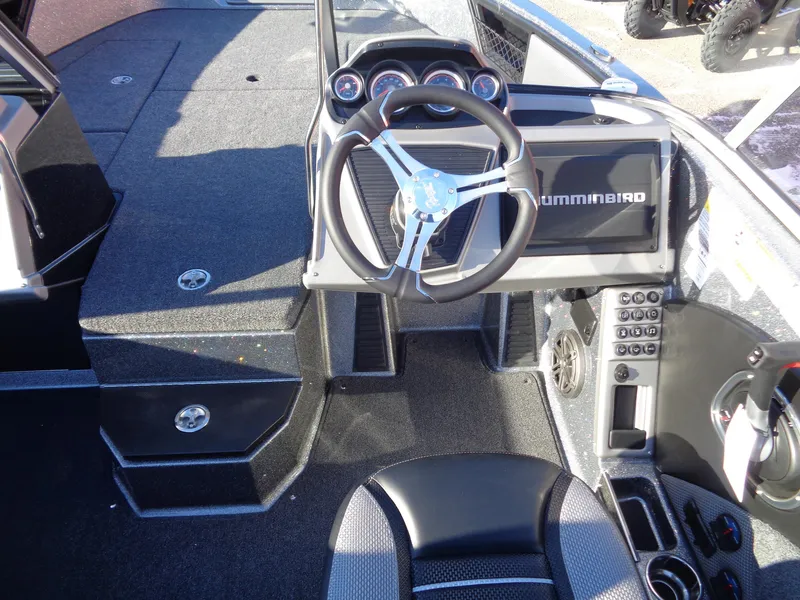 Slide: The Image of 2025 Ranger 1880MS boat interior with steering wheel and control panel. - 8