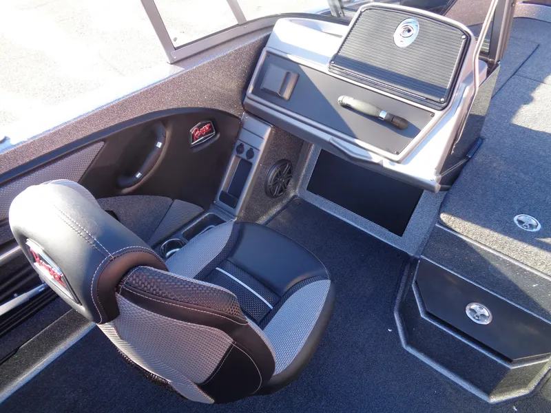 Slide: The Image of 2025 Ranger 1880MS boat interior with sleek seating and modern dashboard design. - 9