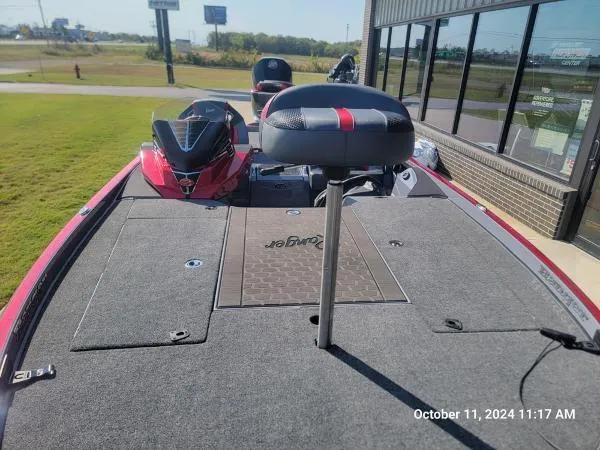 Slide: The Image of 2025 Ranger Z520R Cup-Equipped boat, rear deck view, parked outdoors. - 13