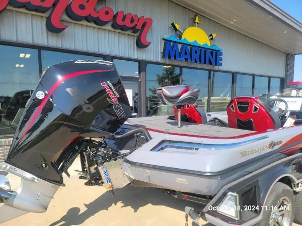 Slide: The Image of 2025 Ranger Z520R Cup-Equipped boat displayed outside marine dealership. - 15