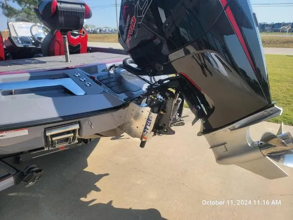 Slide: The Image of 2025 Ranger Z520R Cup-Equipped boat with powerful outboard motor, photographed on a sunny day. - 16
