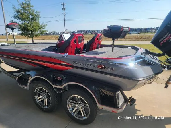 Slide: The Image of 2025 Ranger Z520R Cup-Equipped boat with sleek design and dual seats on a trailer. - 17