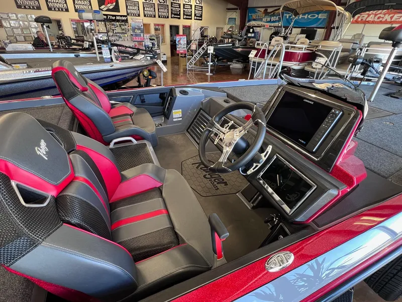 Slide: The Image of 2025 Ranger Z520R Cup-Equipped boat interior with modern dashboard and seating. - 19