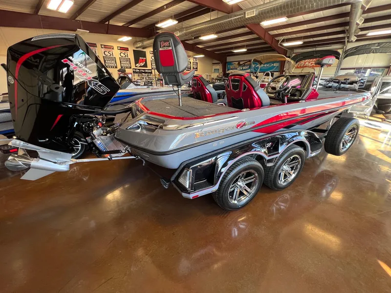 Slide: The Image of 2025 Ranger Z520R Cup-Equipped boat in showroom, featuring sleek design and advanced features. - 21