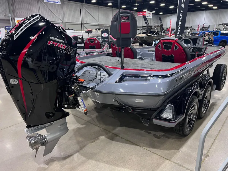 Slide: The Image of 2025 Ranger Z520R Cup-Equipped boat with powerful engine on display indoors. - 23