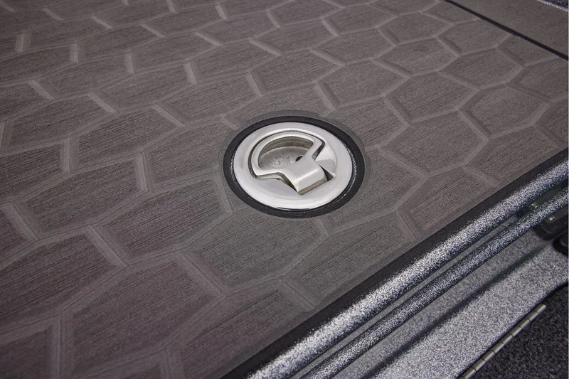 Slide: The Image of 2025 Ranger Z520R Cup-Equipped boat storage compartment with logo and carpeted interior. - 25