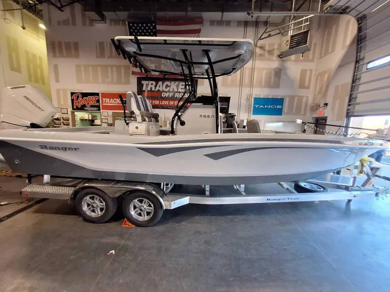 The Image of 2025 Ranger 2660 Bay boat on trailer in showroom, side view. - 0
