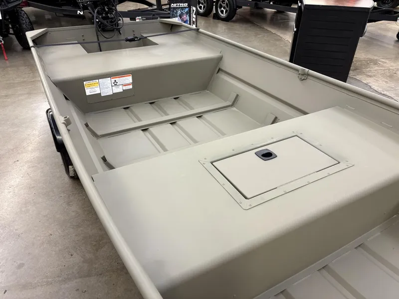 Slide: The Image of 2025 Tracker Grizzly 1542 Utility boat interior, showcasing spacious design and storage compartments. - 3