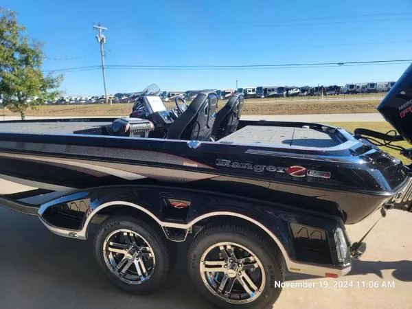 Slide: The Image of 2025 Ranger Z520R Cup-Equipped boat with sleek design and shiny chrome wheels. - 3