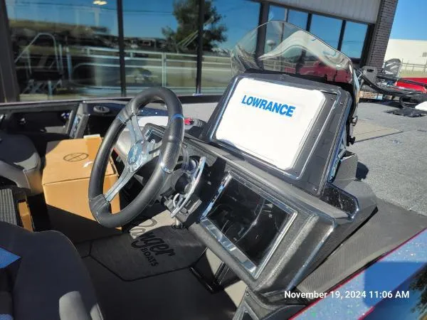 Slide: The Image of 2025 Ranger Z520R Cup-Equipped boat interior with Lowrance navigation system. - 7
