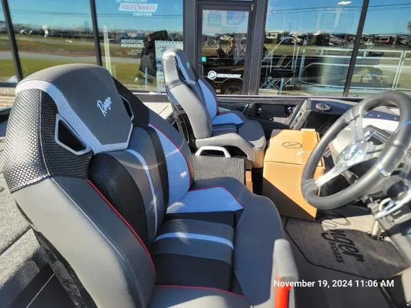 Slide: The Image of 2025 Ranger Z520R Cup-Equipped boat interior with modern seating and steering wheel. - 8