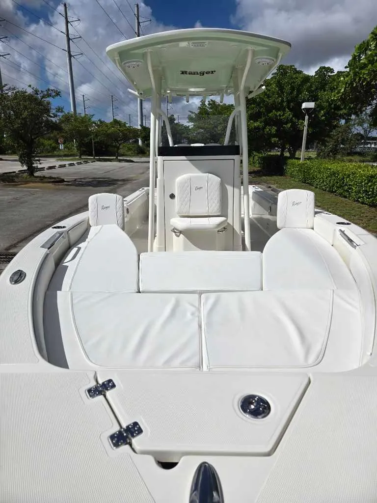 Slide: The Image of 2025 Ranger 2660 Bay boat with sleek white interior and spacious seating. - 3