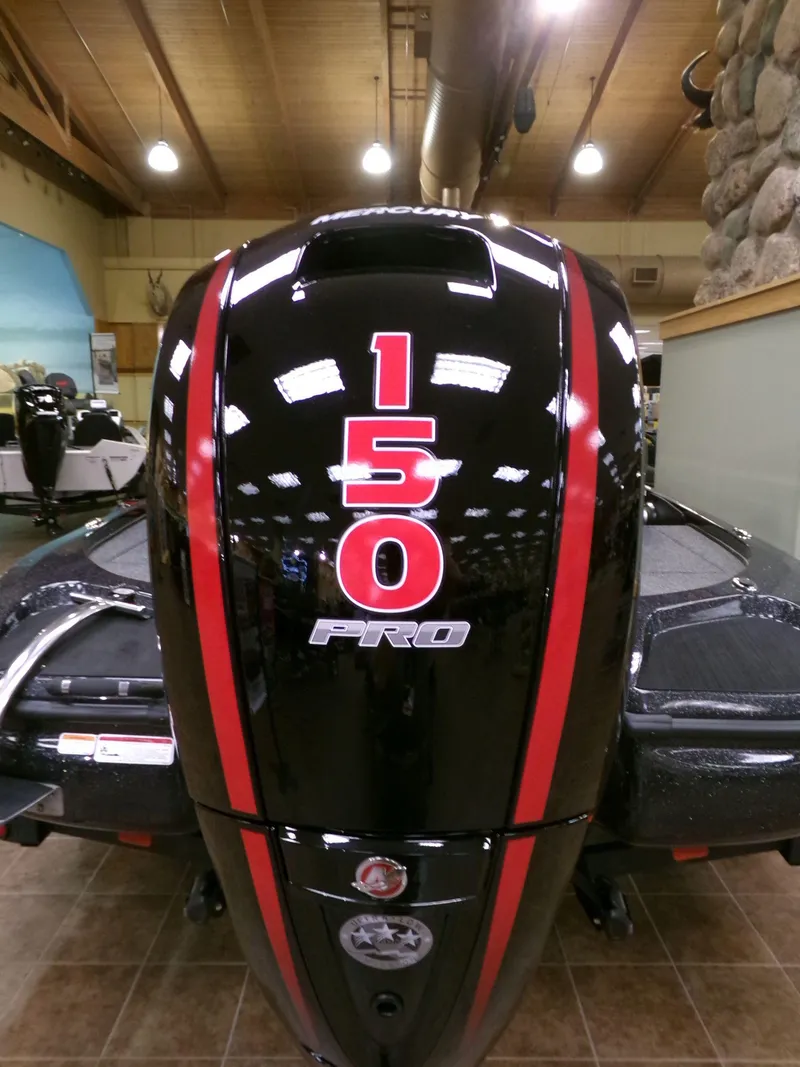 Slide: The Image of 2025 Nitro Z18 boat engine with "150 Pro" branding, displayed indoors. - 2