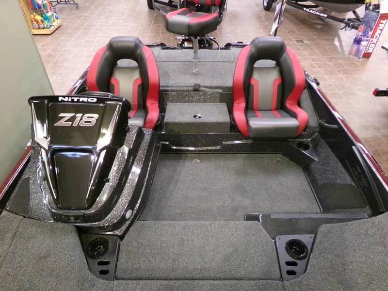 Slide: The Image of 2025 Nitro Z18 boat interior with dual seats and sleek design. - 5