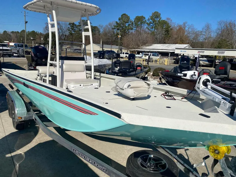 The Image of 2025 Ranger RB200 boat with T-top on trailer, displayed outdoors. - 0