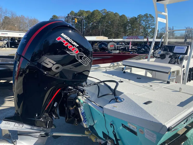 Slide: The Image of 2025 Ranger RB200 boat with Mercury Pro XS engine, displayed outdoors. - 4