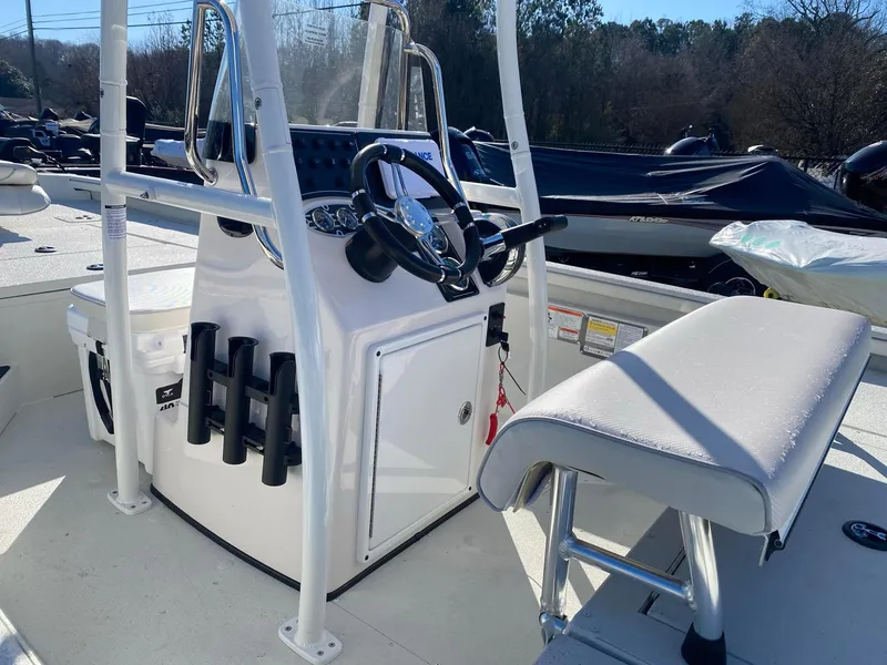 Slide: The Image of 2025 Ranger RB200 boat interior with steering console and seating. - 5