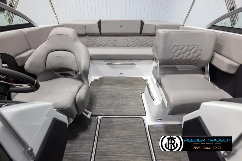 Slide: The Image of Interior of 2025 Four Winns H2 boat with modern seating and sleek design. - 18