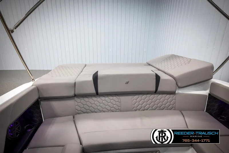 Slide: The Image of 2025 Four Winns H2 boat interior with luxurious gray seating and modern design. - 30
