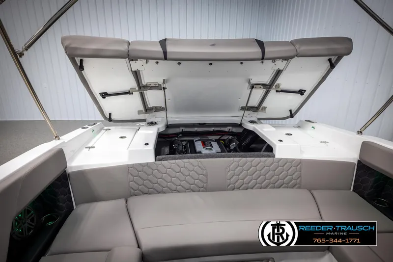 Slide: The Image of 2025 Four Winns H2 boat engine compartment with open hatch, showcasing interior design. - 31