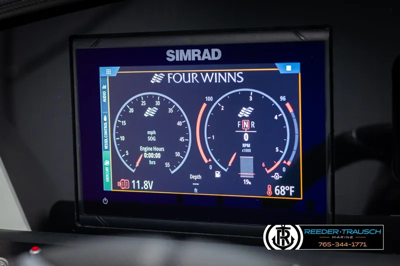 Slide: The Image of Simrad display on 2025 Four Winns H2 boat showing speed, RPM, and temperature. - 38