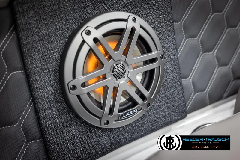 Slide: The Image of Speaker system in 2025 Four Winns H2 boat, featuring JL Audio, with hexagonal upholstery design. - 45
