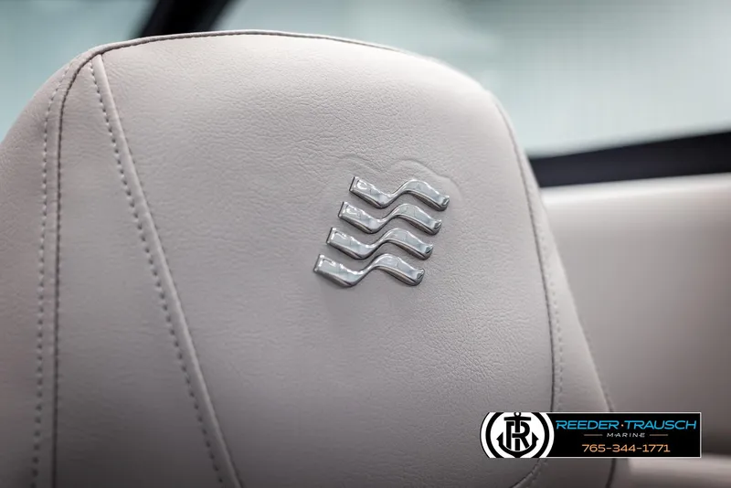 Slide: The Image of 2025 Four Winns H2 boat seat with embossed logo, showcasing luxury marine craftsmanship. - 49