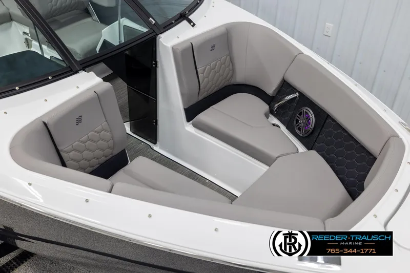 Slide: The Image of 2025 Four Winns H2 boat interior with gray seating and modern design. - 9