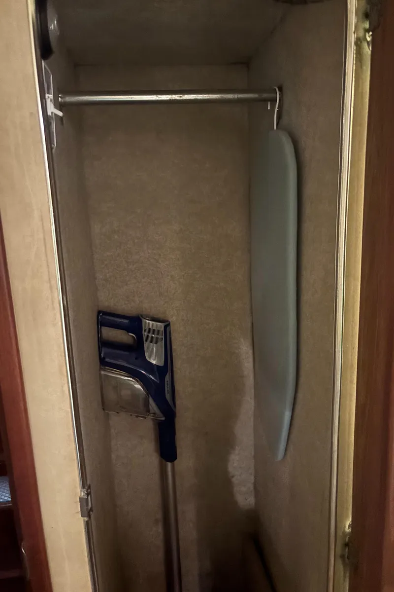 Slide: The Image of 1986 Chris-Craft 381 Catalina closet with vacuum and ironing board. - 41