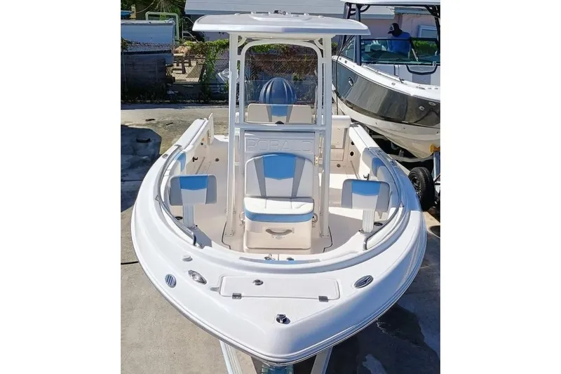 Slide: The Image of 2025 Robalo R222 Center Console boat with sleek design and spacious seating. - 3