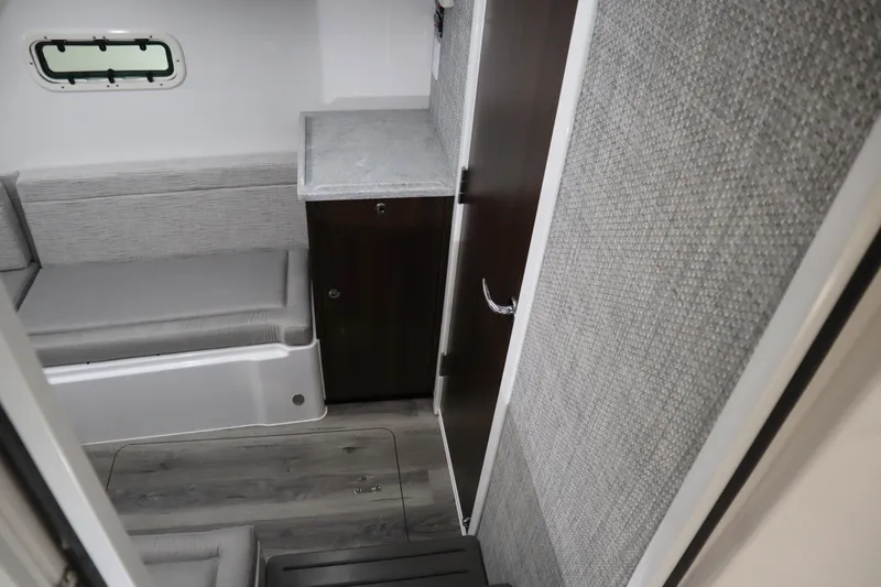 Slide: The Image of Interior cabin of 2025 Everglades 395 Center Console boat, featuring modern design and compact layout. - 15