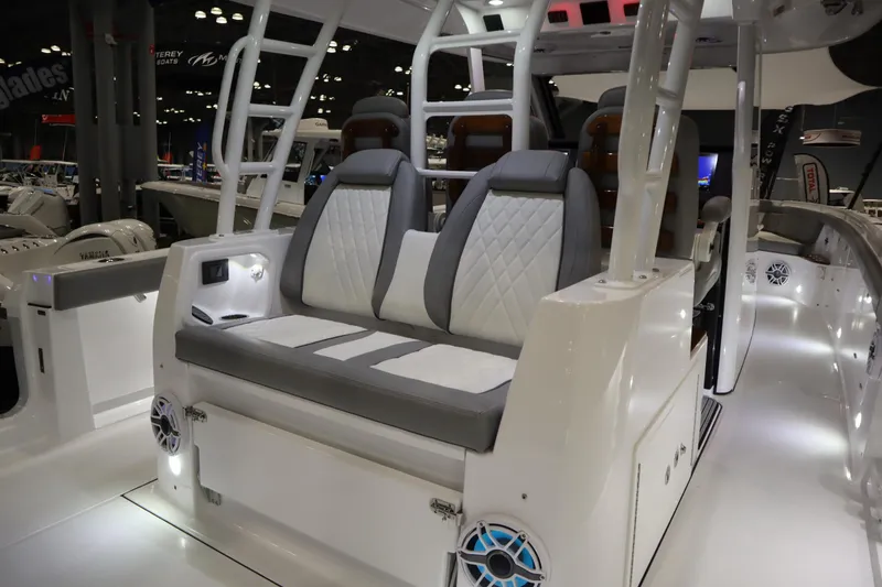Slide: The Image of 2025 Everglades 395 Center Console boat interior with luxurious seating and modern design. - 17