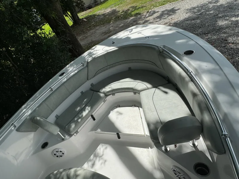 Slide: The Image of 2019 Sportsman Heritage 231 Center Console boat interior with cushioned seating. - 4