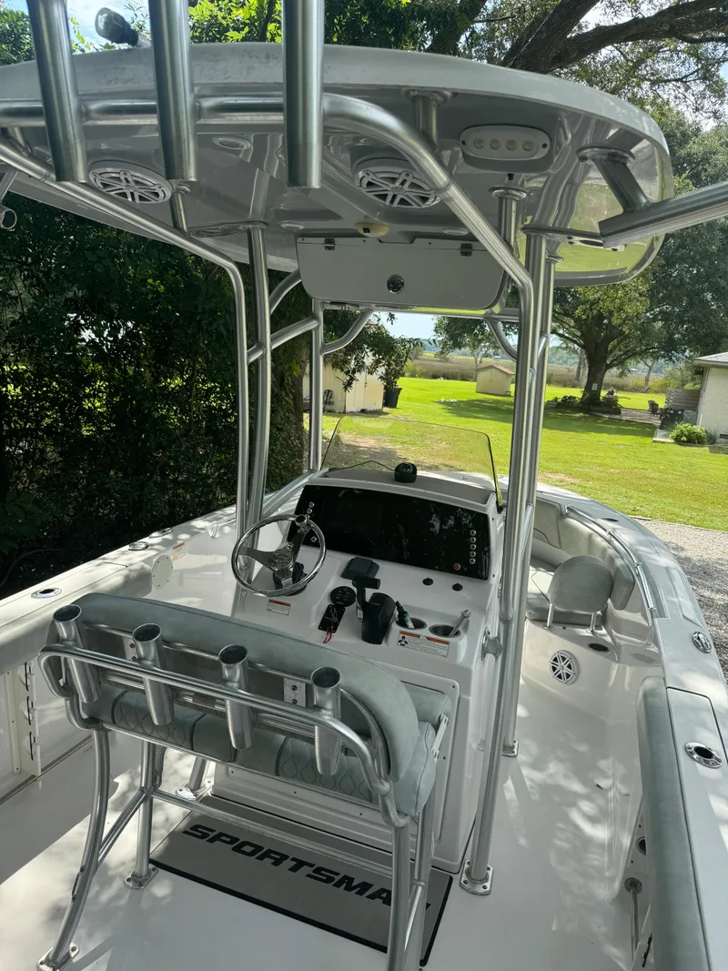 Slide: The Image of 2019 Sportsman Heritage 231 Center Console boat with sleek design and modern features. - 8