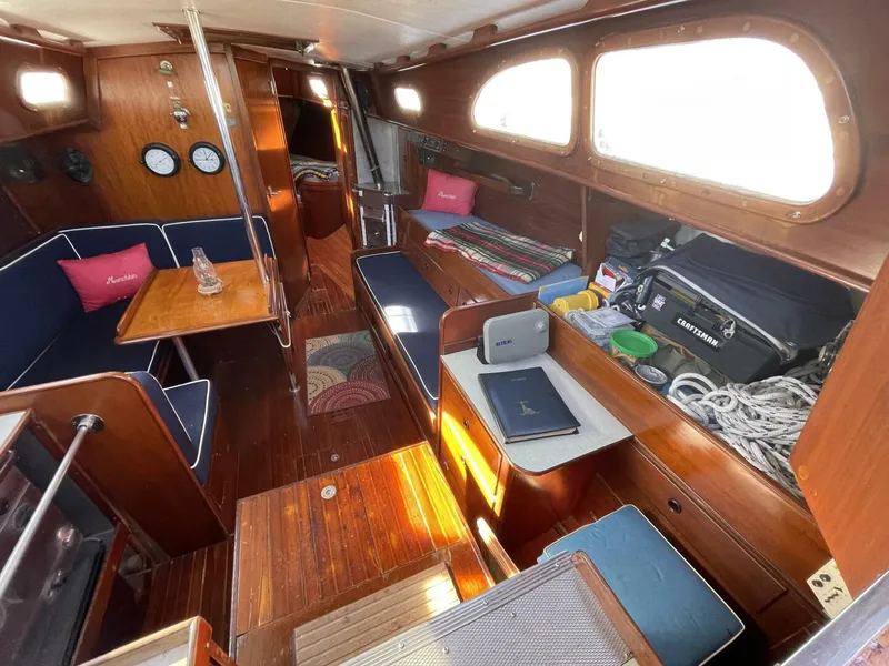 Slide: The Image of Interior of 1968 LeComte Northeast 38 sailboat with wooden furnishings and nautical equipment. - 14