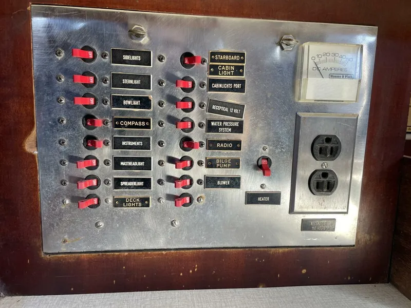 Slide: The Image of Vintage 1968 LeComte Northeast 38 boat control panel with switches and outlets. - 26