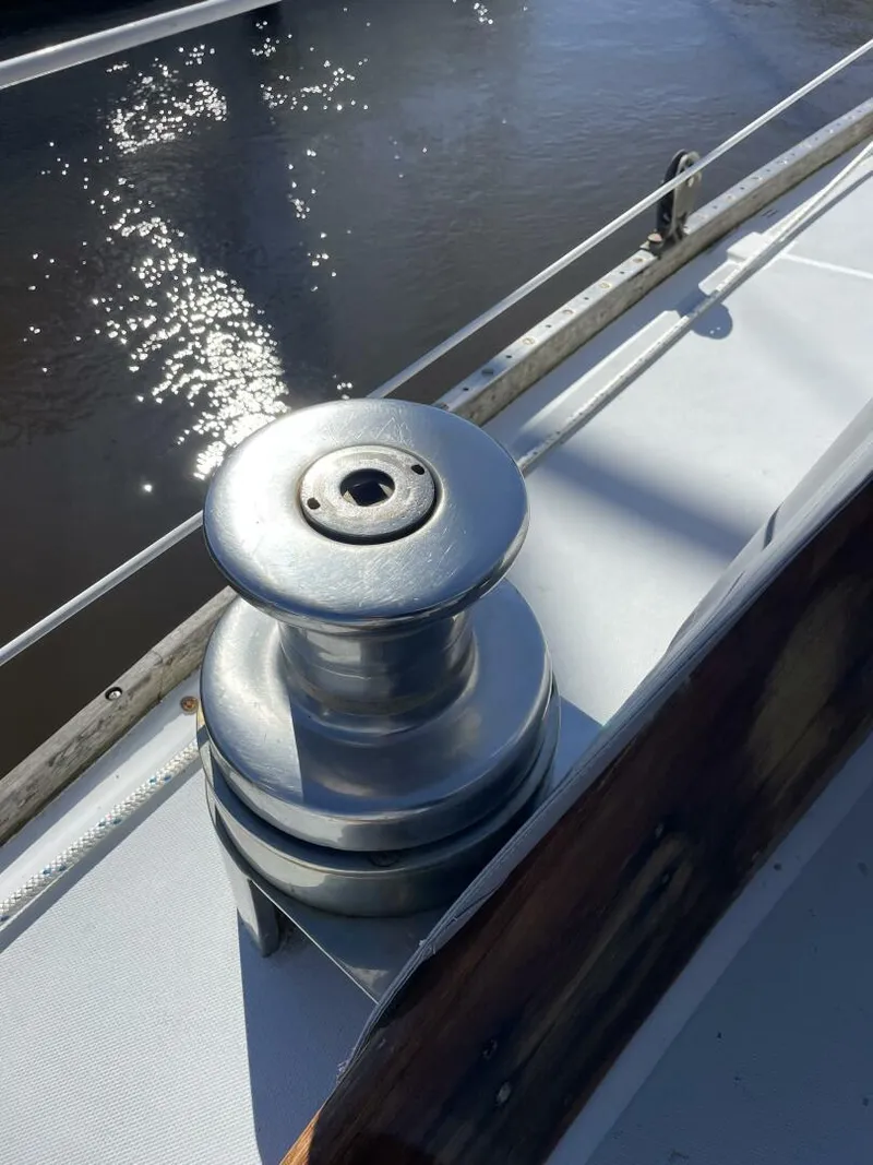 Slide: The Image of Close-up of a winch on a 1968 LeComte Northeast 38 sailboat deck. - 38