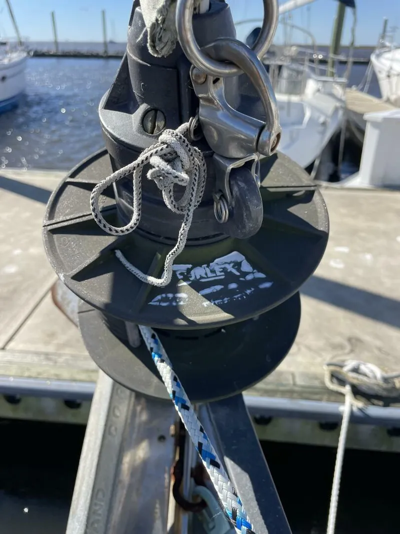 Slide: The Image of Close-up of a 1968 LeComte Northeast 38 sailboat winch at a marina. - 41