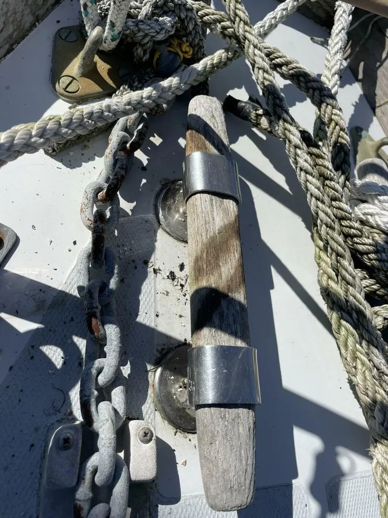 Slide: The Image of Close-up of ropes and cleat on 1968 LeComte Northeast 38 sailboat deck. - 42
