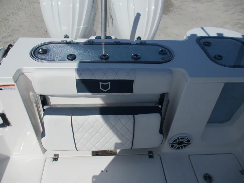 Slide: The Image of 2025 Sea Fox 288 Commander boat interior with cushioned seating and storage. - 10