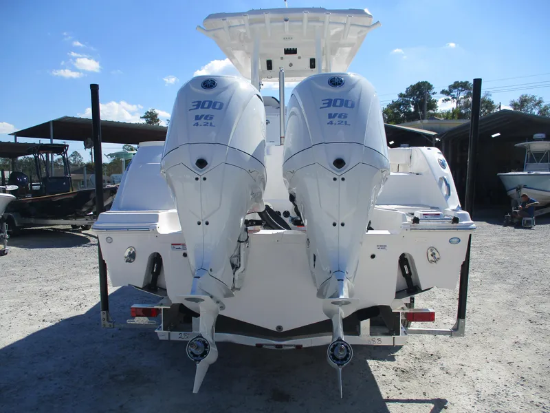 Slide: The Image of 2025 Sea Fox 288 Commander with twin 300 HP engines, rear view. - 3