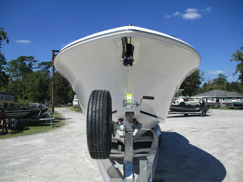 Slide: The Image of 2025 Sea Fox 288 Commander boat on trailer, parked outdoors. - 4