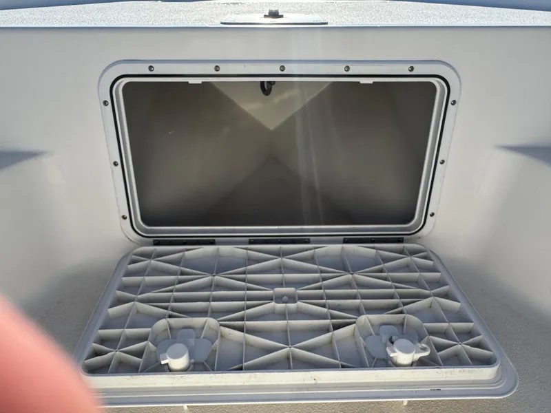 Slide: The Image of Open storage compartment on 2006 NauticStar 1800 Nautic Bay boat. - 10