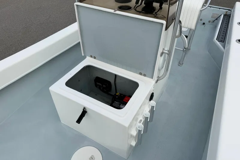Slide: The Image of Open storage compartment on 2020 Privateer 1800 Retriever boat deck. - 16