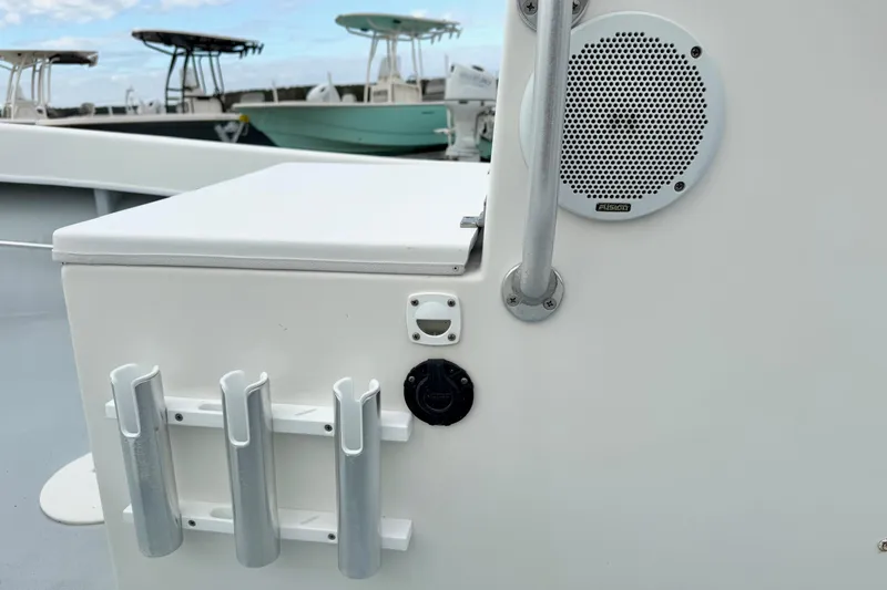 Slide: The Image of 2020 Privateer 1800 Retriever boat with rod holders and speaker on deck. - 17
