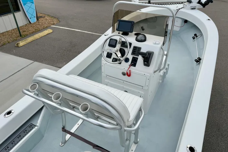 Slide: The Image of 2020 Privateer 1800 Retriever boat interior with steering console and seating. - 20