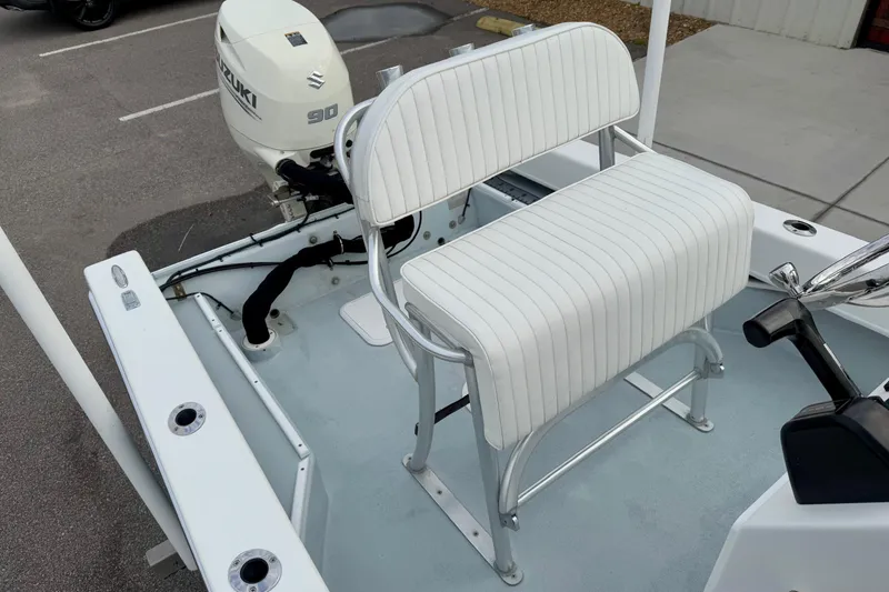 Slide: The Image of 2020 Privateer 1800 Retriever boat with white seating and Suzuki outboard motor. - 22