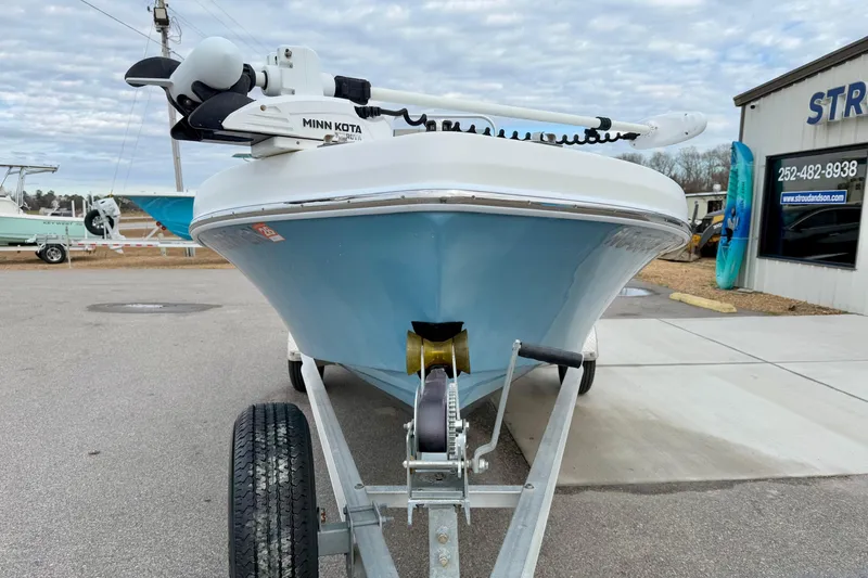 Slide: The Image of 2020 Privateer 1800 Retriever boat on trailer, featuring Minn Kota trolling motor. - 8